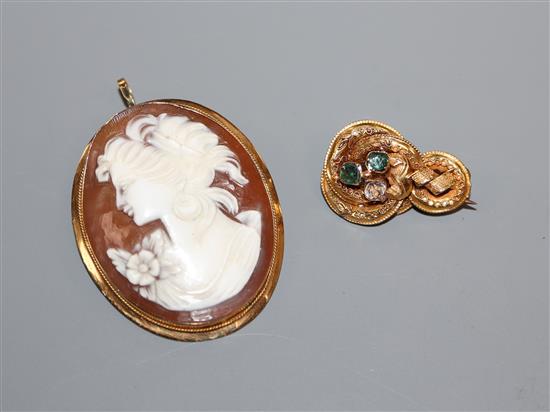 A Victorian gem set knot brooch and a 750 mounted oval cameo pendant brooch.